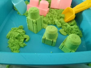 Making LEGO sand blocks with kinetic sand